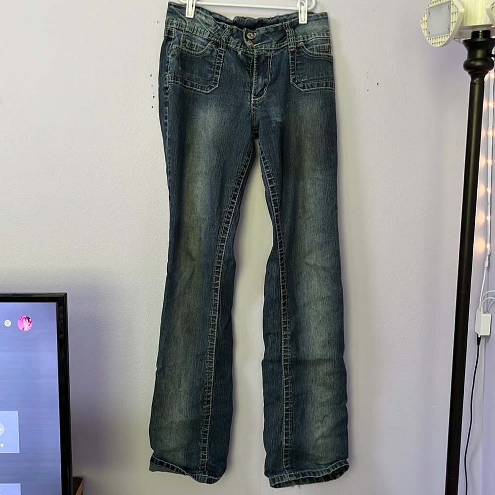Vintage dark wash ANGEL jeans. In good condition.